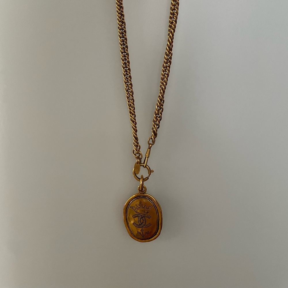 CHANEL Gold-Tone Oval Logo Pendant Necklace